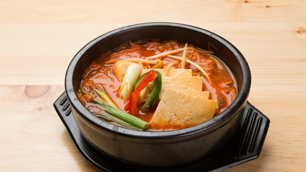 Kimchi Chigae · Pork, tofu and kimchi soup.