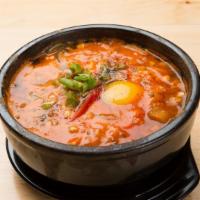 Sundubu Chigae · Spicy seafood, egg, soft tofu, and vegetable soup.