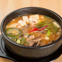 Doen Jang Chigae · Soy bean paste stew with shrimp, clam, tofu and vegetables.