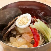 Bi Bim Naeng Myeon · Spicy cold buck wheat noodles and vegetables with a hard boiled egg.