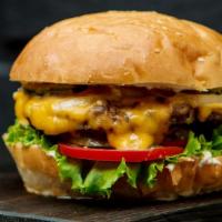 1/3 Lb. Cheeseburger · Char - broiled, Certified Black Angus beef patty, served on a brioche bun with American chee...