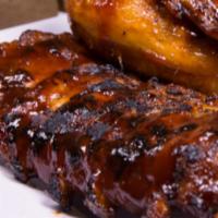 Combination Dinner · 1/2 slab ribs and 1/2 rotisserie chicken slathered in BBQ sauce with garlic bread, coleslaw,...