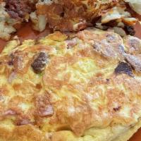 Meateaters Omelette · Includes Bacon, ham, sausage and cheese.
