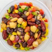 Bean Salad · beans, corn, peppers, jalapeno, cilantro, green & red onion, tomatoes + citrus dressing.