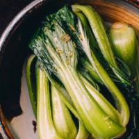 Bok Choy · Baby Bok Choy, wok cooked  with sweet Vietnamese soy sauce, garlic and ginger.  Finished wit...