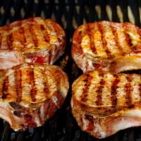 Pork Chops · Marinated overnight in our special spices, fried, grilled or (smothered over rice). Addition...