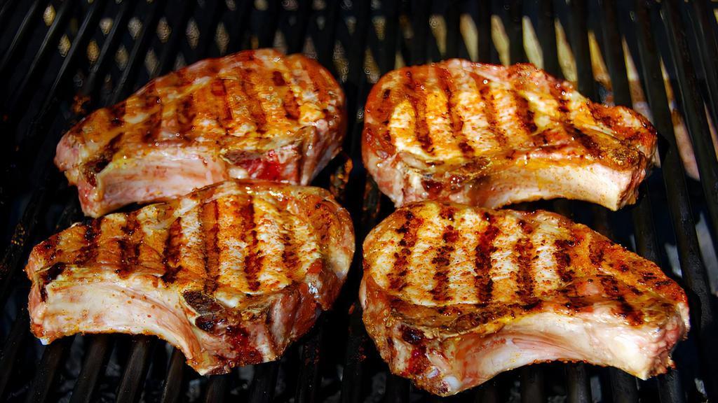 Pork Chops · Marinated overnight in our special spices, fried, grilled or (smothered over rice). Additional Chop $6