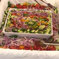 Garden Salad
 · Bed of organic greens, red onion, olives, cucumbers, tomatoes.