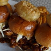 Pulled Pork Sliders · slow cooked bbq pulled pork, topped with coleslaw and fried pickles, served on 3 mini hawaii...