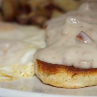 Biscuits & Gravy · 2 biscuits, cajun spiced andouille sausage gravy and two eggs any style.