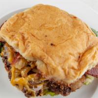 Red Dirt Burger · Single patty with cheddar cheese, crisp, thick-cut hickory smoked bacon, grilled onions, let...