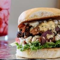 Jailhouse Blues Burger · Single patty covered in delicious melted Bleu cheese crumbles, crisp, thick-cut hickory smok...