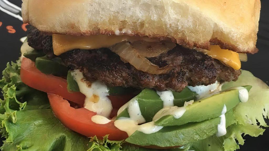 Cali Rancher · Single patty with American Cheese, lettuce, tomato, grilled onions, fresh avocado slices and jalapeño ranch sauce.
