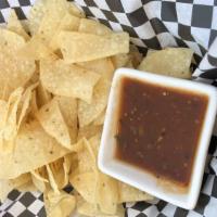 Salsa De Aguacate & Chips · Tomatillo, fresh jalapeno, cilantro, onion, and avocado whipped in a flavorful puree.