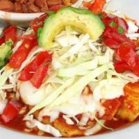Enchilada · Rolled corn tacos with your choice of meat/cheese/veggie, flat grilled. Served with red ench...