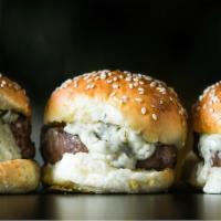Gold Coast Filet Slider (Order) With Fries · 3 pieces of 2 oz filet medallion on a house-made mini sesame seed bun with maitre d' butter....