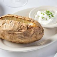 Baked Potato · Whole Idaho potato baked and served with sour cream and chives