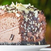 Chocolate Mousse Pie · House made Chocolate mousse with Oreo cookie crumb crust topped with white & dark chocolate ...