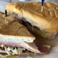 Cuban Sandwich · Ham, pork, cheese, Cuban bread, pickles, mustard.