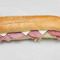 Submarine · A True Classic.  Ham, Salami and Spiced Ham with Lettuce, Tomatoes, Onions, Swiss American C...