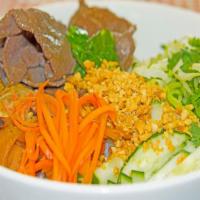 Grilled Pork Vermicelli Noodle Salad · with egg roll, veggie, peanut, sweet and sour fish sauce