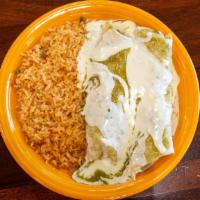 Pork Burritos  · Two pork burritos smothered with tomatillo and cheese sauce, served with rice.