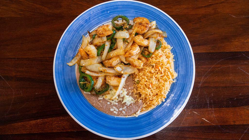 Camarones Mexicanos · Shrimp with onions, tomatoes and jalapeño served with rice, beans and three tortillas.