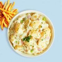 Mashed Potato · Vegetarian. Mashed Idaho potatoes cooked, seasoned with garlic, butter, and topped with cris...