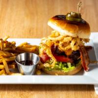 Smoked House Burger · 1/2 Pound Steak Burger, Smother with House BBQ Sauce, Beer Onion Strings, Hickory Smoked Bac...