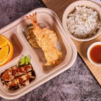 Kid'S Bento Box · Comes w/ Any Base of your choice, 1 protein and side of your choice with side of orange.