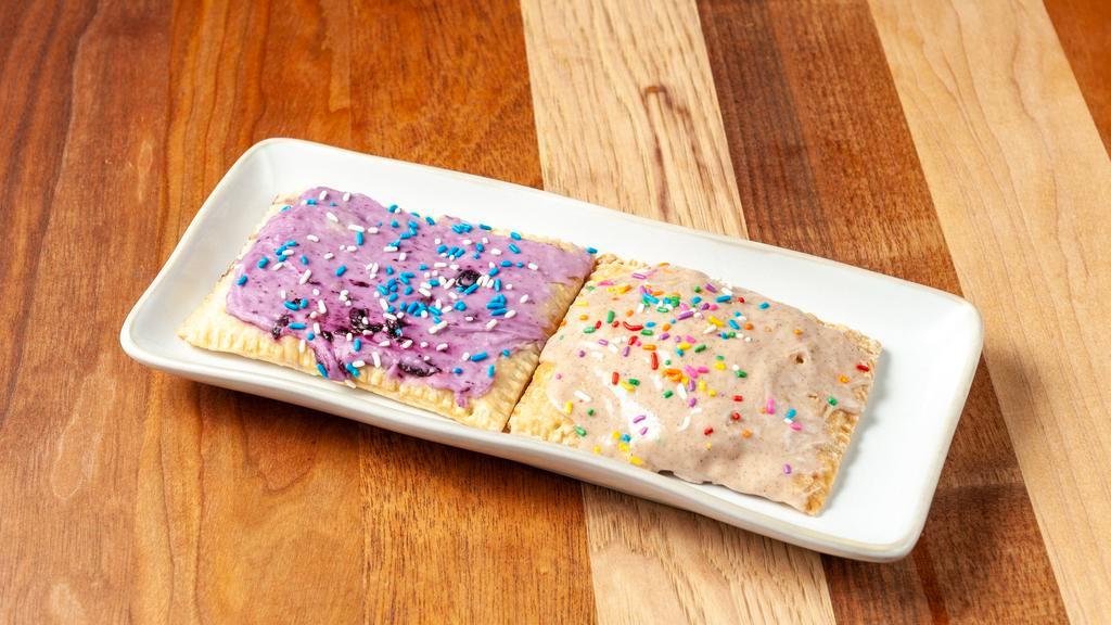 1 Homemade Pop Tart · Your Choice or Our House flavor, Cinnamon and Brown Sugar or our Seasonal Flavor.   Each are sprinkled with Kindness!