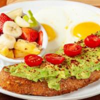 Avocado Toast · This plate is built on the simple truth of good food.  Artisan bread with a fresh avocado ma...