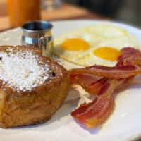 Let'S Make A Toast · Two pasture-raised eggs,* choice of meat and Cinnamon Swirl French toast.