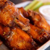 Fresh Hot Wings · 1 pound of fresh wings, covered in a chili powder rub, fried with housemade hot sauce served...