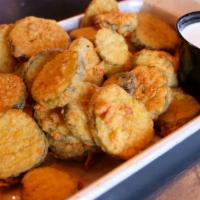 Fried B&B Pickles · House-made bread and butter pickles battered and deep-fried to a golden brown. Served with h...