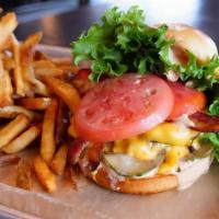Bacon Cheese Burger · Two smash-cooked patties topped with American cheese, smoked bacon, lettuce, tomato, and hou...