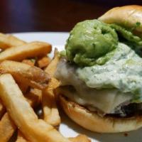 The Chimi Burger · Two smashed-cooked patties topped with Monterey Jack cheese, avocado mousse, caramelized oni...