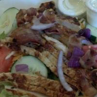 Cobb Salad · with lettuce, grilled chicken, bacon bits, cheddar and mozzarella cheeses, red onions, tomat...