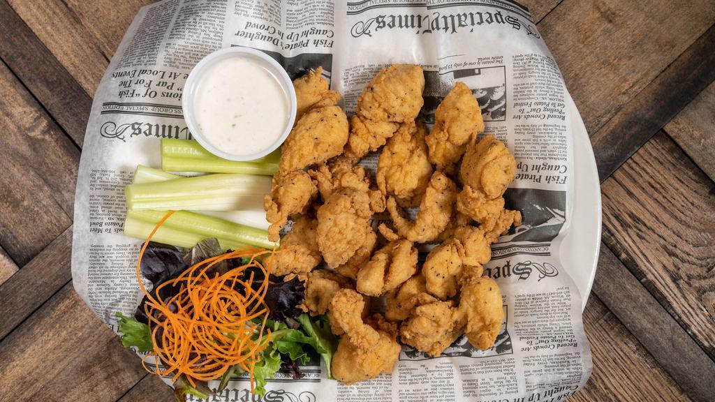 Boneless Chicken Bites · Topped with your choice of wing sauce. Served with celery and appropriate dipping sauce.