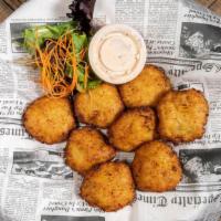 Conch Fritters (8 Pieces) · Served with Asian remoulade.