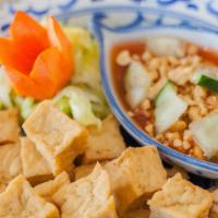 Tow Hu Tod / Fried Tofu · Deep-fried tofu served with sweet and sour sauce and crushed peanut.