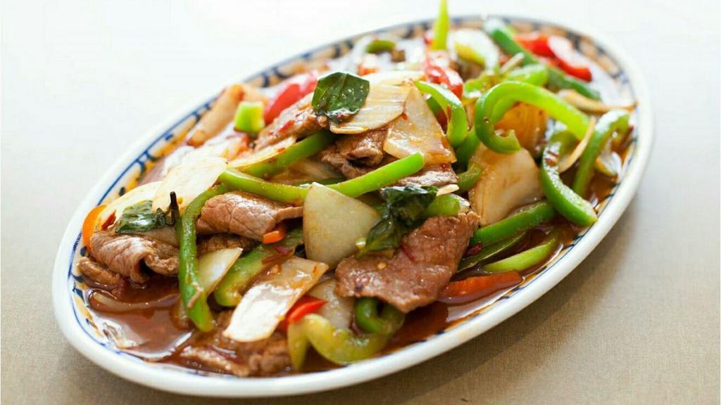 Pad Krapow / Spicy Basil · Traditional Bangkok food and centre of Thailand, stir-fried meat with chili, garlic, white onions, julienne bell peppers, fresh green beans and basil.