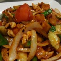 Pad Priew Waan / Stir-Fried Sour & Sweet · Stir-fried meat, white onions, julienne bell peppers, carrots, cucumber, pineapple chunks, t...