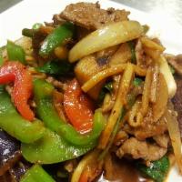 Pad Phed / Spicy Eggplant · Stir-fried meat with curry paste, eggplant, white onions, julienne bell peppers and basil.