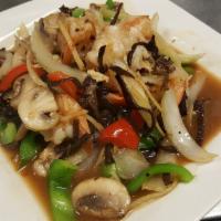 Pad Khing / Stir-Fried Ginger · Stir-fried meat, fresh ginger, white onions, julienne bell peppers, mushroom, baby corn, car...