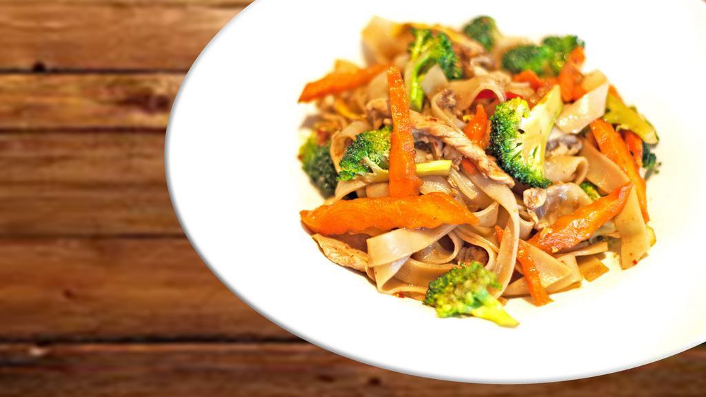 Pad See Ewe · Stir -fried flat noodle with cabbage, broccoli and egg in homemade sauce.