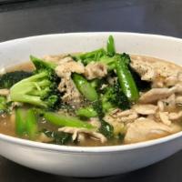 Rad Nah · These noodles dish is between soup and stir-fried, flat noodles, stir-fried served with grav...