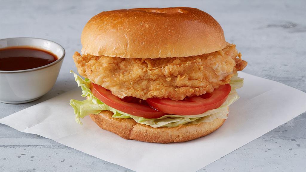 Classic Chicken Sandwich · Grilled or Fried Chicken Breast, Served with Lettuce, Tomato, and your Favorite Flavor! 420-1,372 cal.