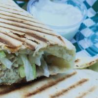 Chicken Shawarma · Special. Chicken shawarma wrap with pickle and creamy garlic sauce, toasted.