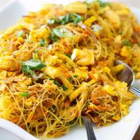Singapore Rice Noodles · Spicy. Shrimp, roast pork, chicken, vegetable & egg.
